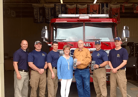 Buckley Security Service donated GoPro cameras to the Pearl Fire Department.